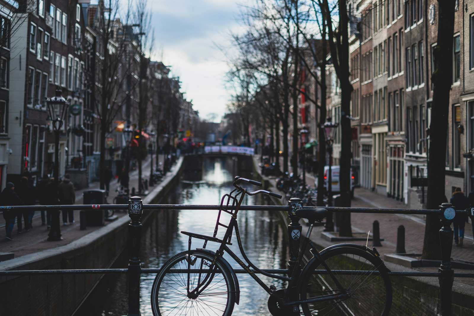 An Amsterdam canal with a bike