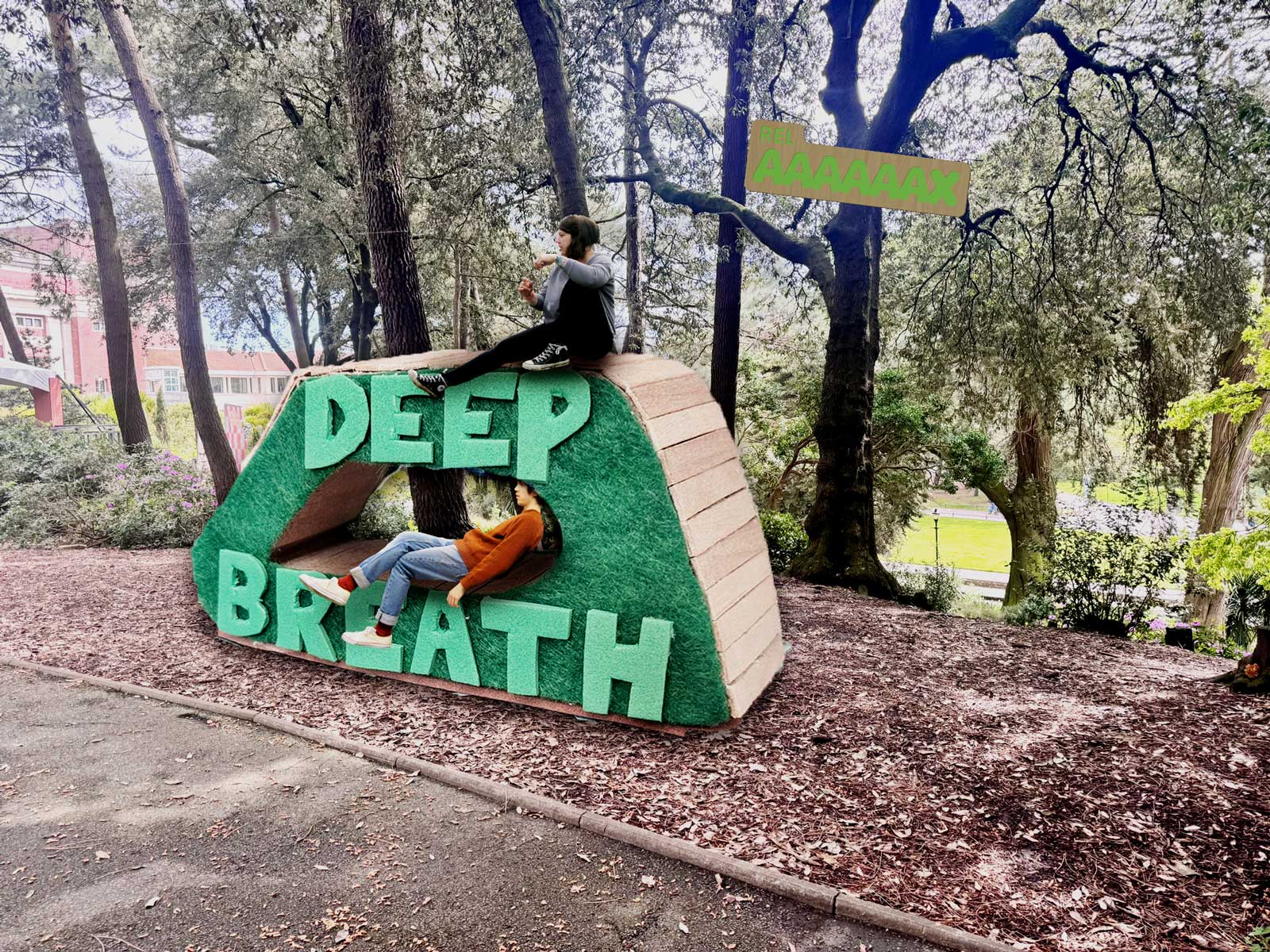 A huge seating structure in 
		Bournemouth Gardens Woods with the words deep breath on it