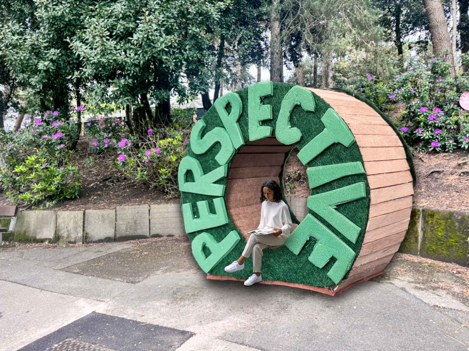 A huge seating structure in 
		Bournemouth Gardens Woods with the word perspective on it